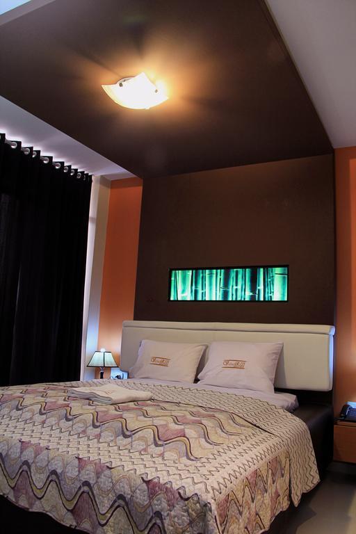 Villa Real Hotel & Suites Чиклайо Стая снимка