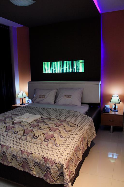 Villa Real Hotel & Suites Чиклайо Стая снимка